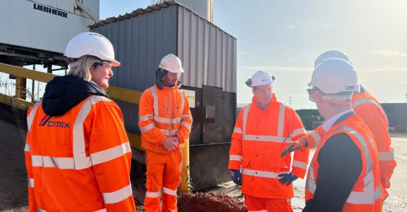 Jessica Morden with workers at Cemex, Newport